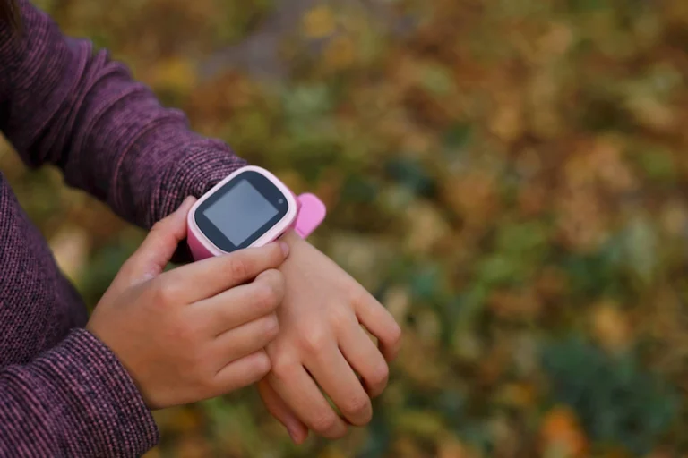 Kid Using Smart Watch GPS Tracking Device Safety